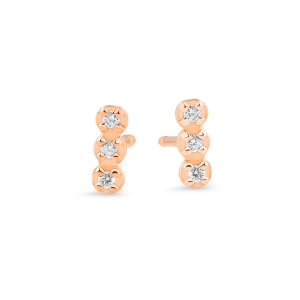 18 Karat rose gold studs and diamonds<br>by Ginette NY