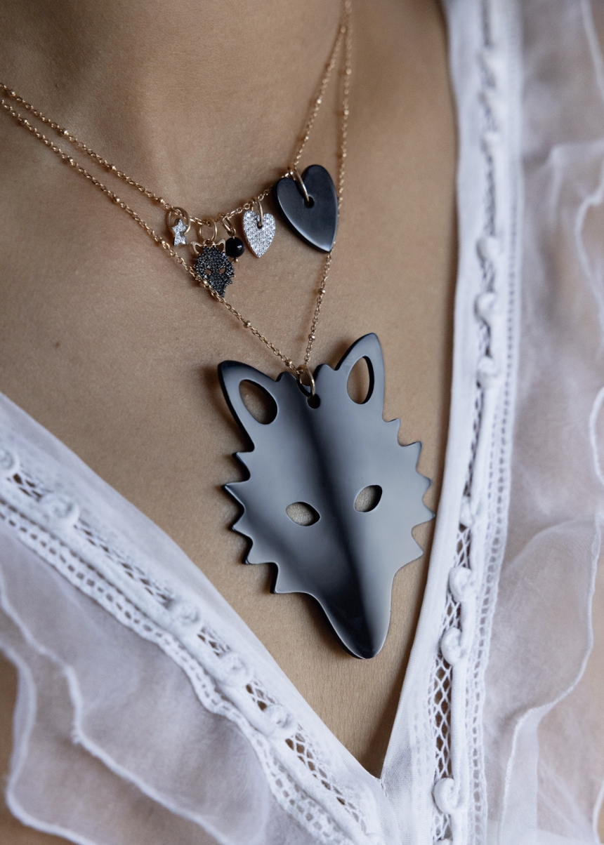 black diamond wolf charm