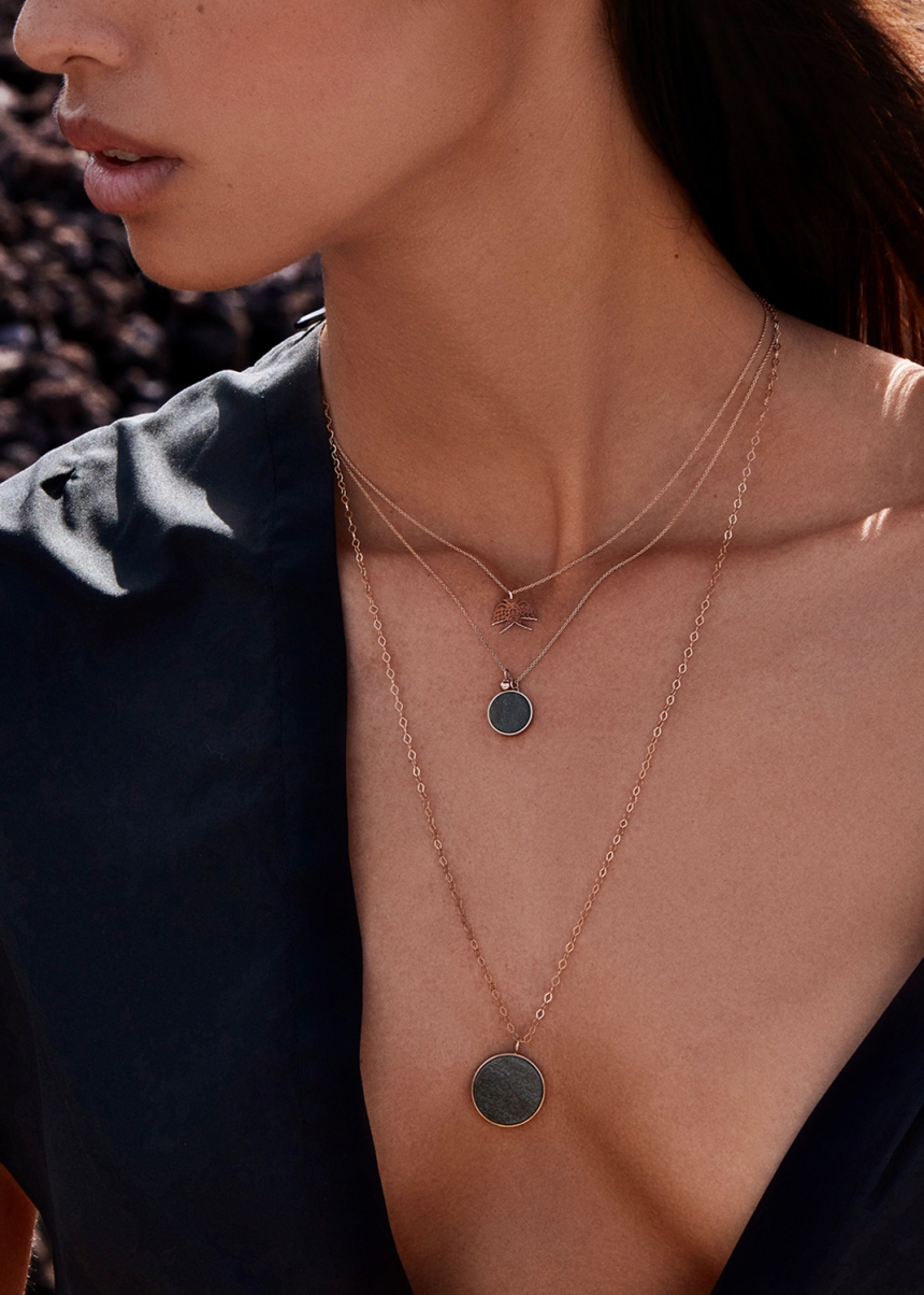 ever golden obsidian disc on chain