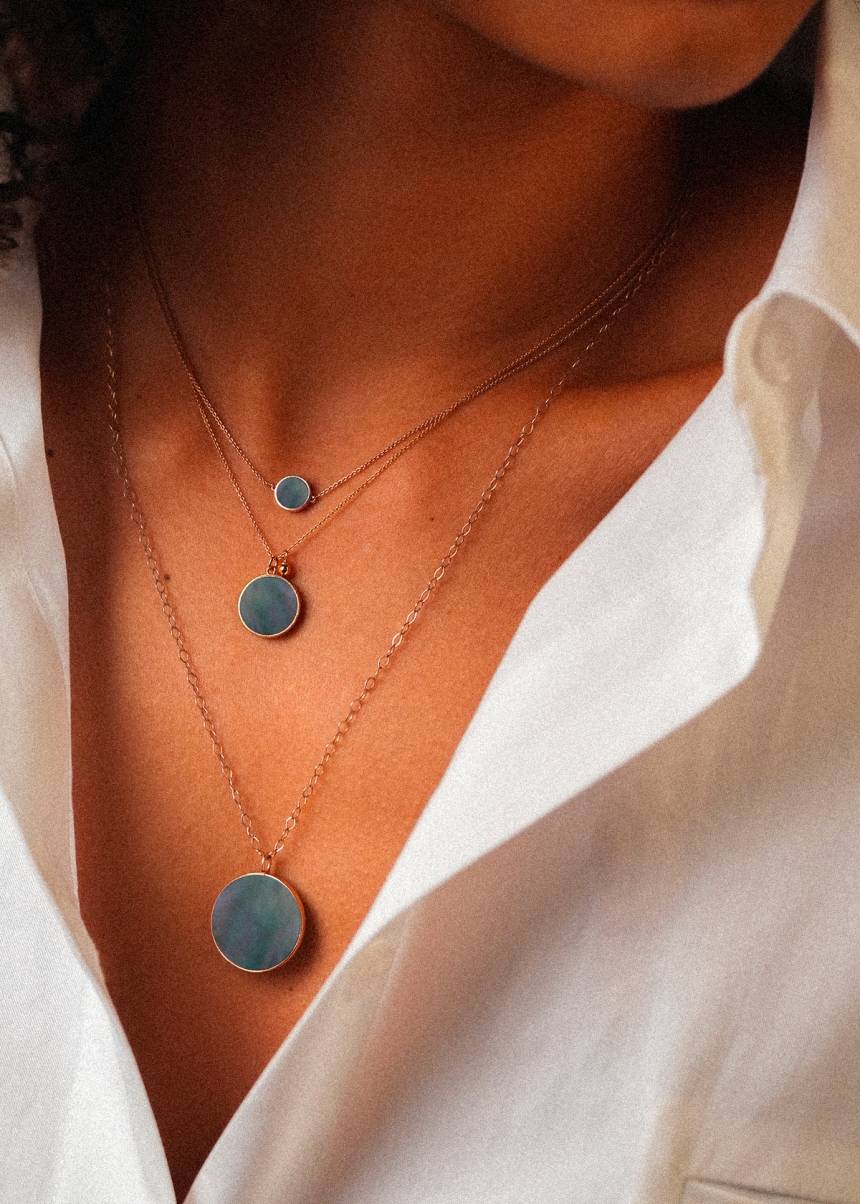 jumbo ever black MOP disc on chain